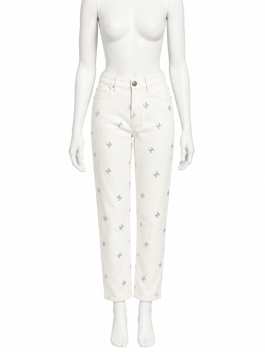 Chanel ivory embroidered CC jeans slimmer shorter fit on white mannequin
