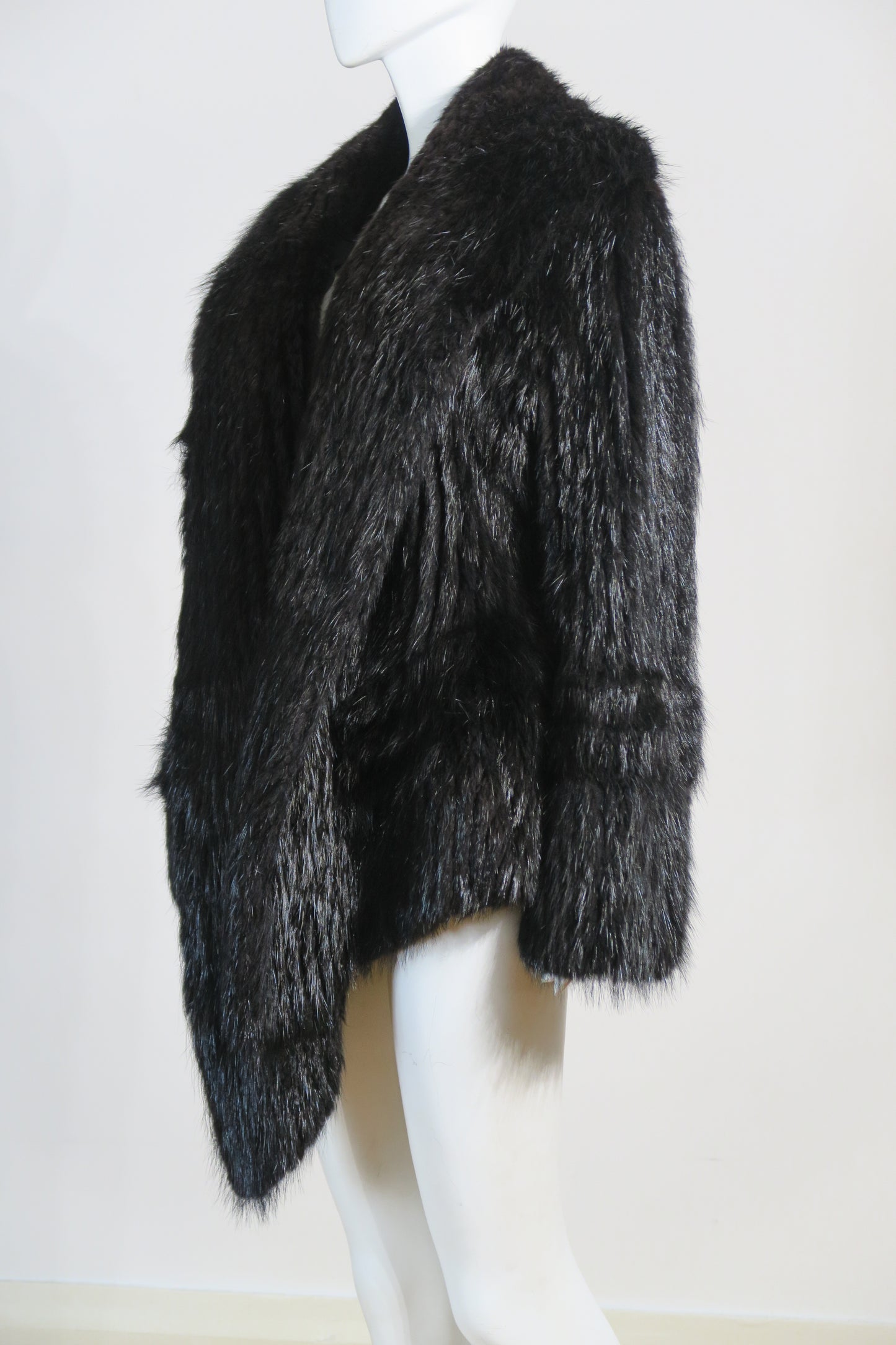 Dior dramatic fur opera coat oversized silhouette