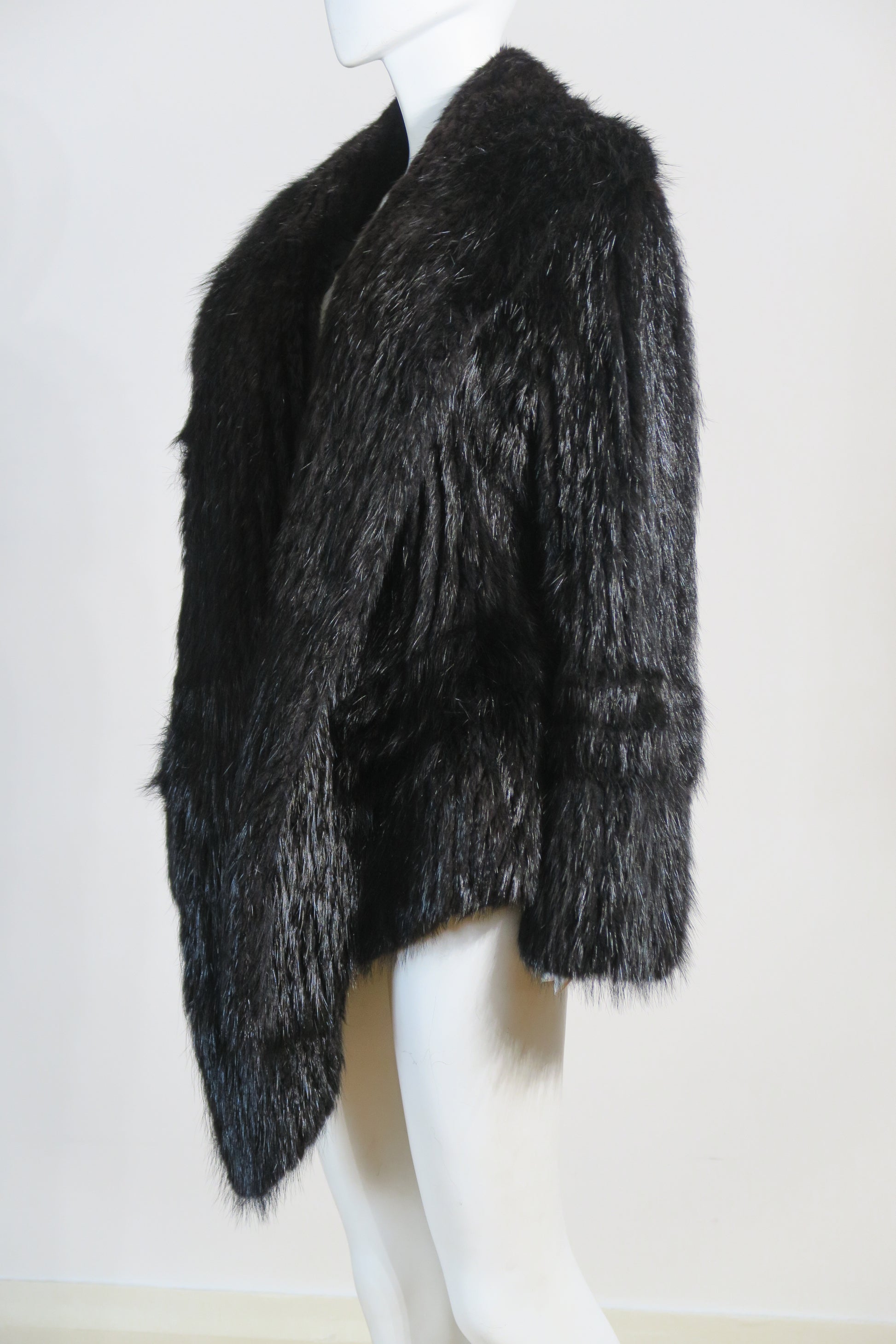 Dior dramatic fur opera coat oversized silhouette