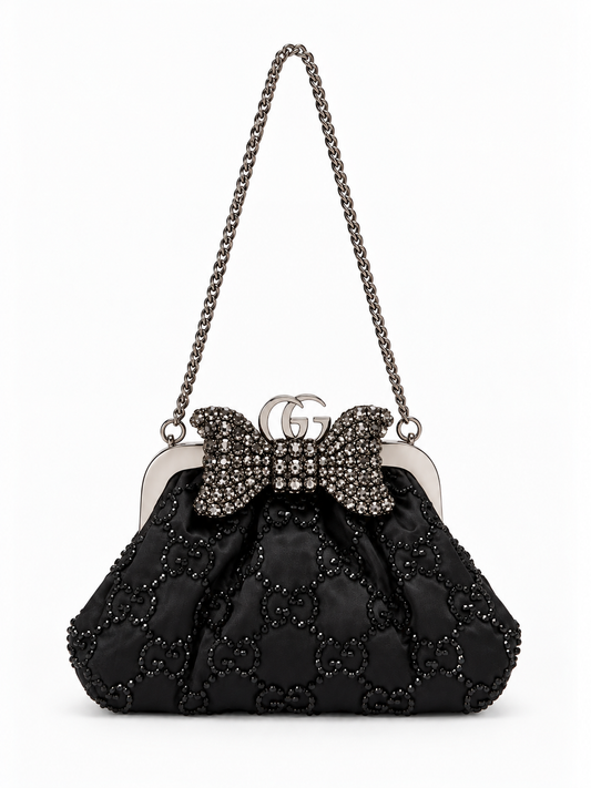 Gucci crystal bow monogram mini clutch